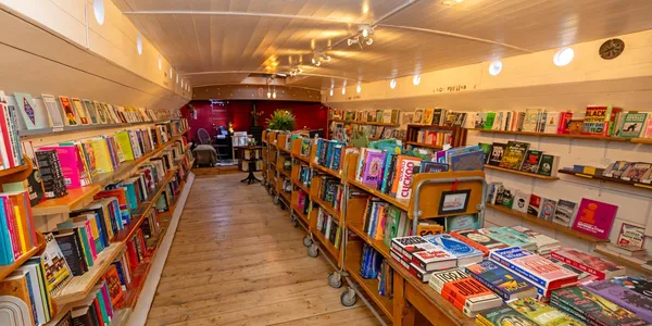 The historic former coal barge Marjorie R. that houses the Hold Fast Leeds floating bookshop